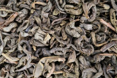 Kurumuş yeşil çay yaprakları.