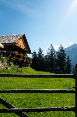 Alpine hut Bergeralm shelter in Anterselva valley in Italian dolomite mountain for trekking and hiking tourism destination clipart