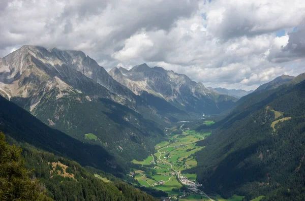 Aerial view of green valley of Anterselva, Antholzertal, in South Tyrol, Italy, with mountains and picturesque villages