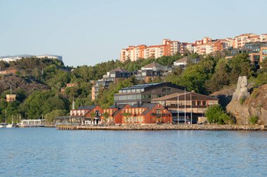 View from the west of Nacka Strand quay and water front area in Nacka outside Stockholm in late summer evening
