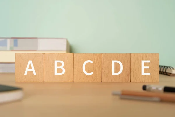 Wooden Blocks Abcde Text Concept Pens Notebooks Books — Foto Stock