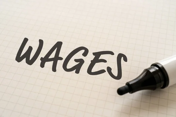 White Paper Written Wages Marker — Stockfoto