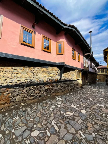 Traditional Ottoman house in pink color. Old Ottoman village, UNESCO World Heritage Site. Old wooden mansion of Turkish architecture. Wooden Ottoman mansion
