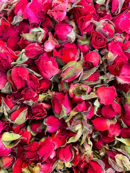 Dried roses as background. Red roses, close-up. High quality photo