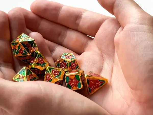 stock image Colorful dungeons and dragons dice set held in hands for tabletop gaming enthusiasts.