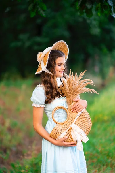 Young Pretty Blonde Curly Girl Straw Hat Basket Vintage Dress — Stock Photo, Image