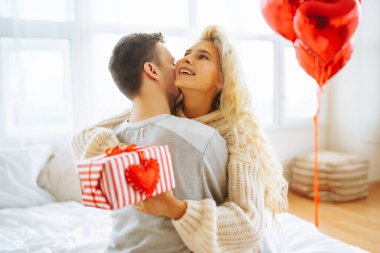 Exchange of gifts. Romantic day together. Valentines day, couple, relationships and people concept.