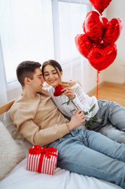 Exchange of gifts. Romantic day together. Valentines day, couple, relationships and people concept.