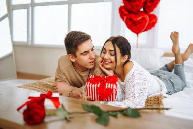 Exchange of gifts. Romantic day together. Valentines day, couple, relationships and people concept.