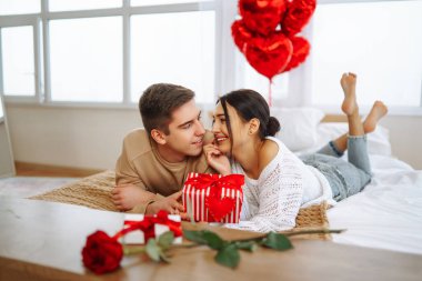 Exchange of gifts. Romantic day together. Valentines day, couple, relationships and people concept.