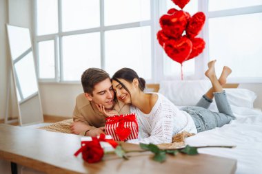 Exchange of gifts. Romantic day together. Valentines day, couple, relationships and people concept.