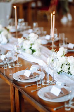 Table set for wedding or another catered event dinner ceremony. Wedding, birthday, party, event concept.