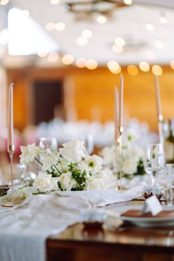 Table set for wedding or another catered event dinner ceremony. Wedding, birthday, party, event concept.