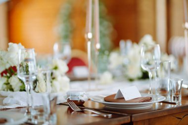 Table set for wedding or another catered event dinner ceremony. Wedding, birthday, party, event concept.