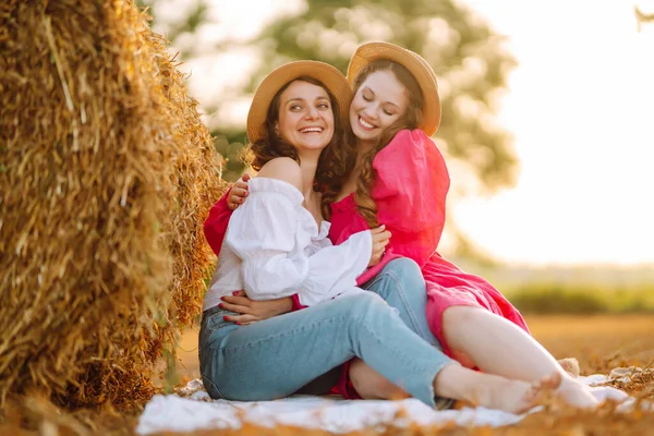 Two Young Woman Haystack Sunset Nature Vacation Relax Lifestyle — Stock Photo, Image