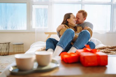 Exchange of gifts. Romantic day together. Valentines day, couple, relationships and people concept.