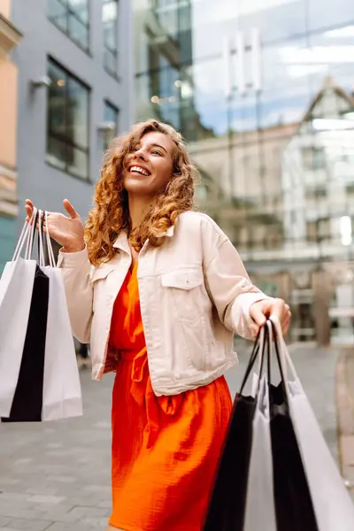 Cheerful Woman Holding Shopping Bags Beautiful Woman Casual Style Shopping Stock Photo