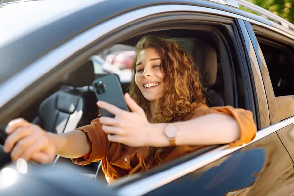 Young Woman Texting Her Smartphone While Driving Car Car Sharing Stok Foto