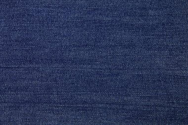 Blue jeans fabric background texture. Blue jeans fabric cloth textile material.