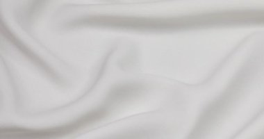 White fabric background. White cloth waves background texture. White fabric cloth textile material.