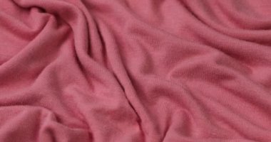 Pembe kumaş arka plan. Pembe bez dalga arkaplan dokusu.