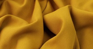 Sarı kumaş arka plan. Sarı bez dalga arkaplan dokusu.