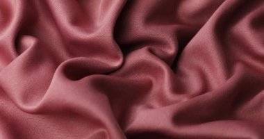 Pink fabric background. Pink cloth waves background texture. Pink fabric cloth textile material.