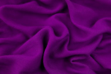 Mor kumaş arka plan. Mor kumaş dalgaları arka plan dokusu. Mor kumaş kumaş kumaş kumaş..