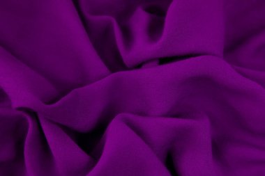 Mor kumaş arka plan. Mor kumaş dalgaları arka plan dokusu. Mor kumaş kumaş kumaş kumaş..