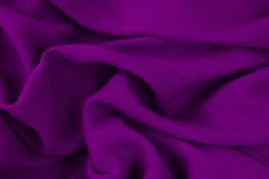 Mor kumaş arka plan. Mor kumaş dalgaları arka plan dokusu. Mor kumaş kumaş kumaş kumaş..