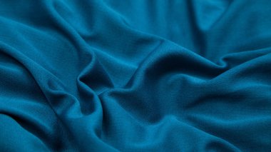 Mavi kumaş arka plan. Seçici odak.