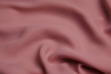 Pembe kumaş arka plan. Seçici odak.