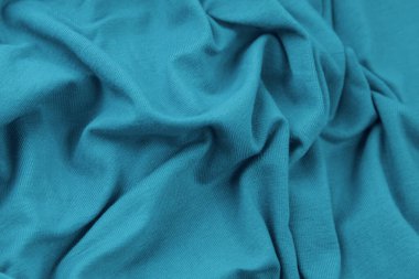 Mavi kumaş arka plan. Seçici odak.