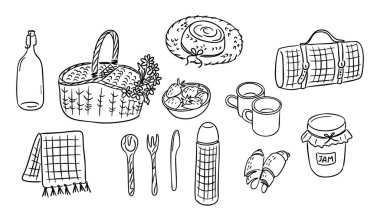 Yemek, battaniye, sepet ve siyah çizgili aksesuarlı el yapımı piknik seti. Boş zaman, açık hava yemeği ve rahat kırsal yaşam tarzı kavramı.