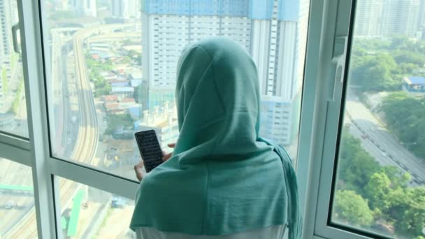 Young Arab Muslim Woman Headscarf Hijab Using Smart Phone Home — Stock Video