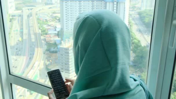 Young Arab Muslim Woman Headscarf Hijab Using Smart Phone Home — Stock Video