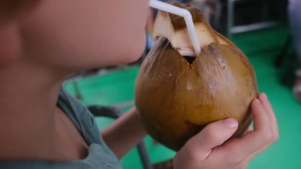 Cute Boy Drinking Coconut Milk — Stock Video