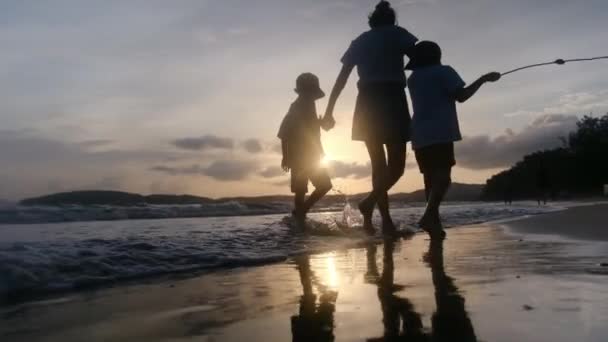 Mother Sons Walking Ocean Beach Sunset Sunny Day Sea Coast — Stock Video