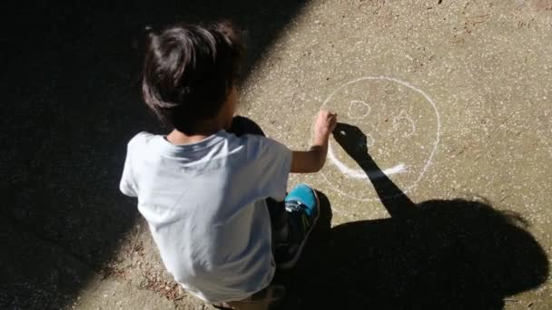 Young Child Drawing Sidewalk Chalk — Stock Video