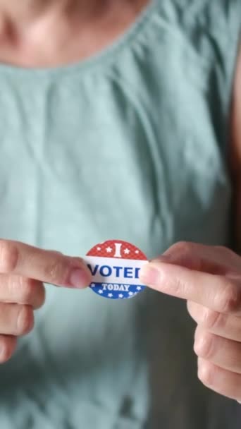Woman Putting Voted Today Badge Her Clothes — Stock Video