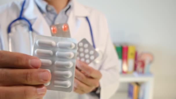 Doctor Holding Pills Hands Close — Stock Video
