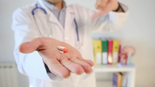 Doctor Holding Pills Hand Showing Thumb — Stock Video