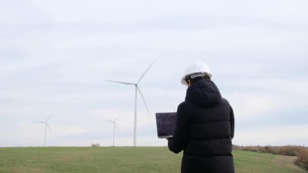 Woman Engineer Laptop Computer Working Countryside Wind Turbines — Video