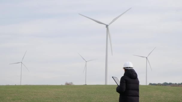 Woman Engineer Computer Working Countryside Wind Turbines — Wideo stockowe