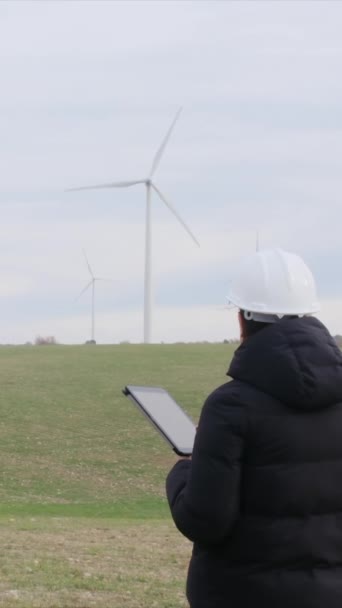 Woman Engineer Tablet Computer Working Countryside Wind Turbines — Video
