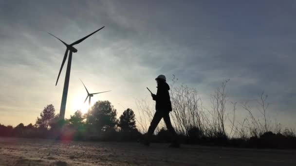 Young Woman Engineer Tablet Computer Checking Wind Turbines — Video