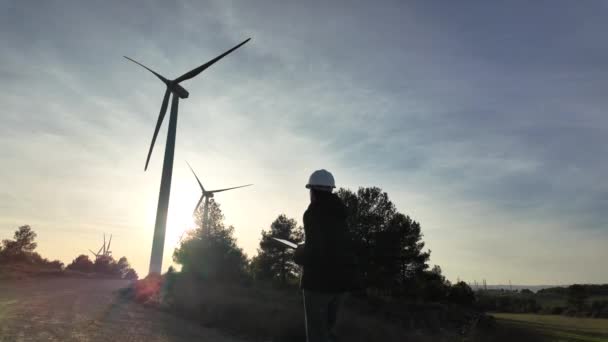 Young Woman Engineer Tablet Computer Checking Wind Turbines — Vídeo de Stock