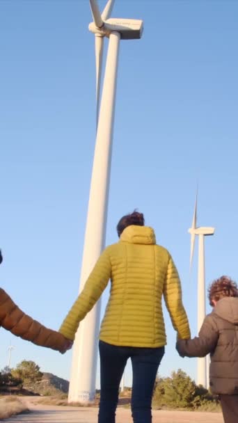 Mother Sons Walking Wind Turbines Together Sunny Day — Stock Video