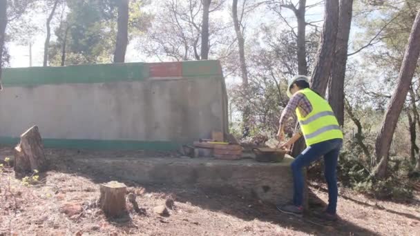 Female Worker Wearing Uniform Helmet Mixes Cement Bowl Construction Site — Stock Video
