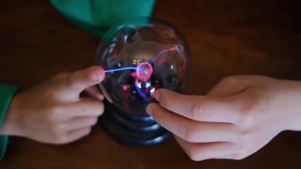 Little Boys Studying Plasma Ball Lightning Table — Stock Video